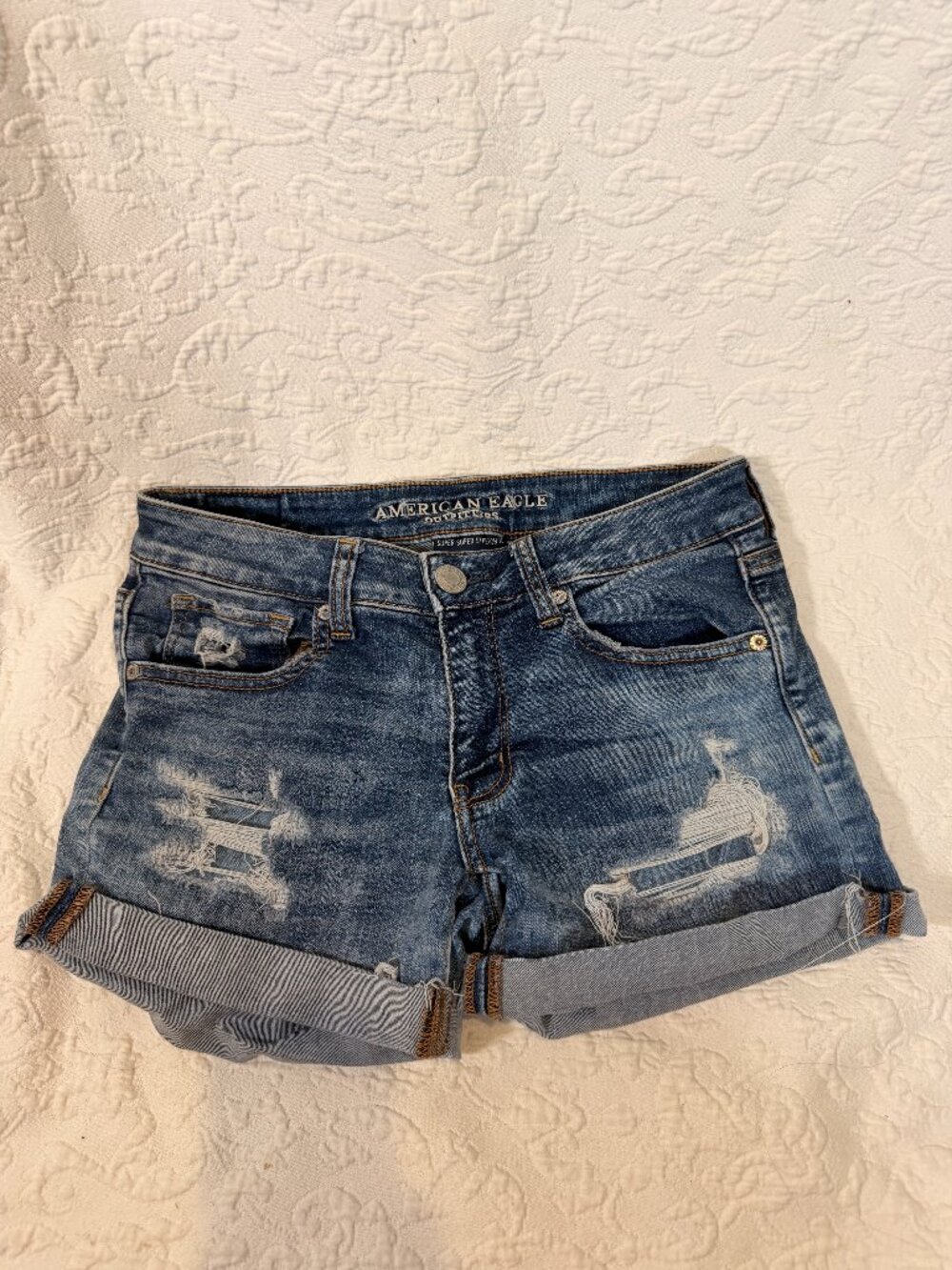 American Eagle Women's Blue Ripped Shorts